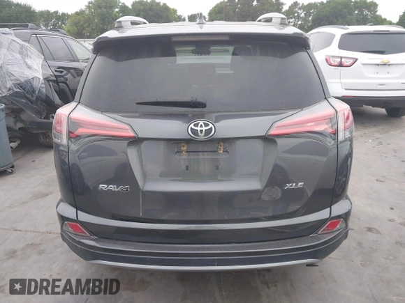 2018 Toyota RAV4 XLE with VIN 2T3WFREV1JW512476, listed as a IAAI auction lot 42177733 with 132,207 mi miles and . Bid and sale history available at DreamBid. Image 16.