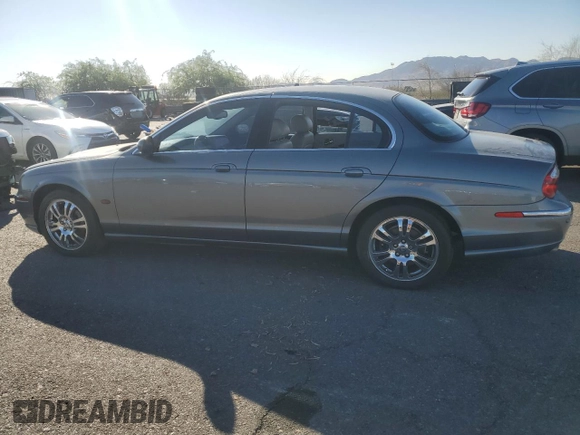 2003 Jaguar S-Type z VIN SAJEA01U03HM57757, wystawiony jako Copart lot #73440434 z przebiegiem 188 389 mil mil oraz Szkoda całkowita • Salvage title. Historia ofert i sprzedaży dostępna na DreamBid. Obrazek 2.