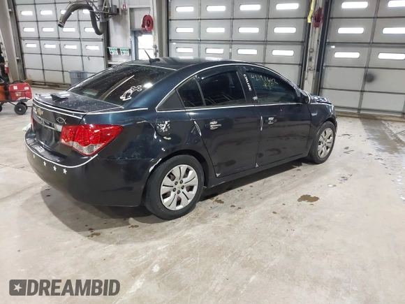 2014 Chevrolet Cruze LS z VIN 1G1PA5SH3E7473796, wystawiony jako IAAI lot #42191642 z przebiegiem 63 873 mil mil oraz . Historia ofert i sprzedaży dostępna na DreamBid. Obrazek 4.