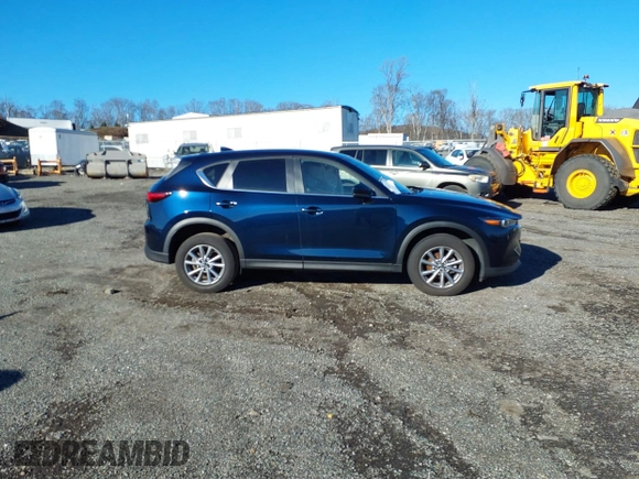 2023 Mazda CX-5 2.5 S Select Package with VIN JM3KFBBM3P0197783, listed as a IAAI auction lot 40989935 with 11,833 mi miles. Bid and sale history available at carsss.com. Image 13.