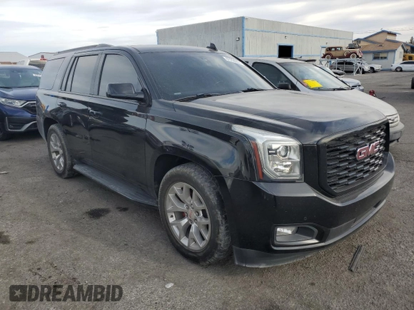 2019 GMC Yukon SLE with VIN 1GKS1AKC2KR101675, listed as a Copart auction lot 87256804 with 144,572 mi miles and Salvage Title. Bid and sale history available at carsss.com. Image 4.