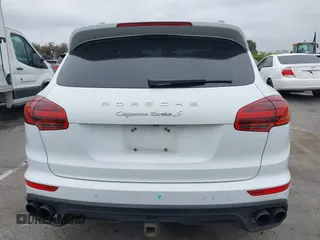 2016 Porsche Cayenne Turbo z VIN WP1AC2A20GLA85193, wystawiony jako IAAI lot #42170440 z przebiegiem 95 999 mil mil oraz . Historia ofert i sprzedaży dostępna na DreamBid. Obrazek 17.