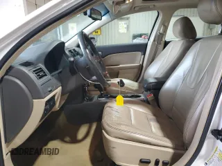 2012 Ford Fusion SEL with VIN 3FAHP0JA9CR167134, listed as a Copart auction lot 50869835 with 128,956 mi miles and Salvage Title. Bid and sale history available at DreamBid. Image 7.