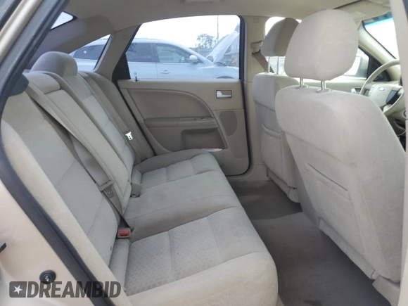 2006 Ford Five Hundred SE с VIN 1FAFP23146G150401, выставлен на аукционе Copart как лот 57000605 с пробегом 218 689 миль миль и Списание • Salvage title. История ставок и продаж доступна на DreamBid. Изображение 10.