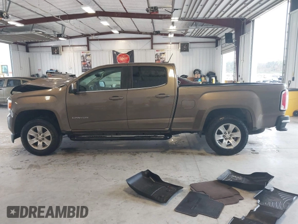 2015 GMC Canyon 2WD SLE with VIN 1GTG5BE31F1166383, listed as a IAAI auction lot 41640378 with 334,016 mi miles. Bid and sale history available at carsss.com. Image 14.