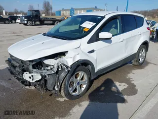 2014 Ford Escape SE with VIN 1FMCU9GX9EUE31926, listed as a IAAI auction lot 41729195 with 104,049 mi miles. Bid and sale history available at carsss.com. Image 19.