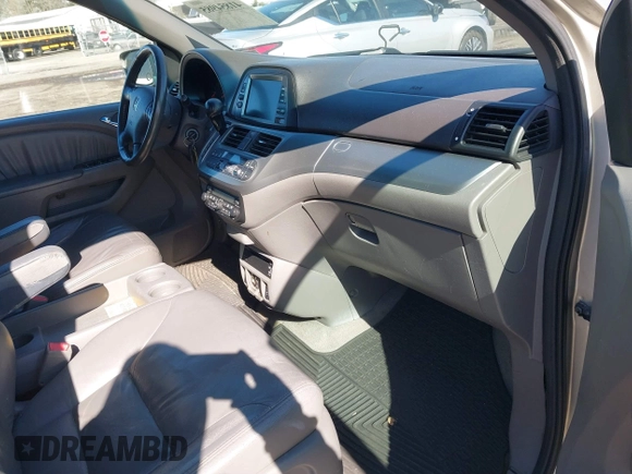 2008 Honda Odyssey EX-L with VIN 5FNRL38708B110657, listed as a IAAI auction lot 41854985 with 253,985 mi miles and . Bid and sale history available at carsss.com. Image 5.