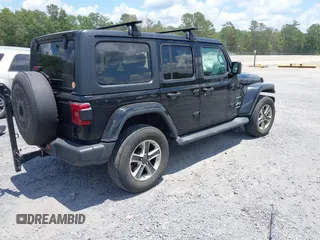 2021 Jeep Wrangler Unlimited Sahara with VIN 1C4HJXEN9MW681422, listed as a IAAI auction lot 42563426 with 48,582 mi miles and . Bid and sale history available at DreamBid. Image 4.