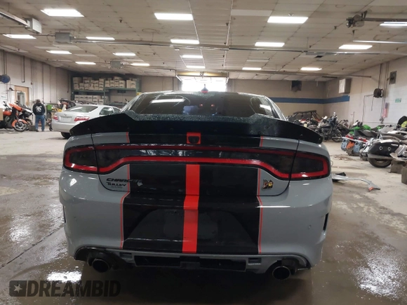 2021 Dodge Charger Scat Pack Widebody with VIN 2C3CDXGJ4MH540627, listed as a IAAI auction lot 41171991 with 31,394 mi miles and . Bid and sale history available at DreamBid. Image 17.