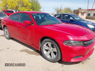 2015 Dodge Charger SE z VIN 2C3CDXBG8FH785073, wystawiony jako IAAI lot #41940067 z przebiegiem 103 979 mil mil oraz . Historia ofert i sprzedaży dostępna na DreamBid. Obrazek 1.