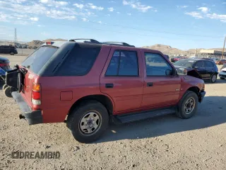 1997 Isuzu Rodeo z VIN 4S2CK58VXV4315798, wystawiony jako Copart lot #68860764 z przebiegiem 241 215 mil mil oraz Szkoda całkowita • Salvage title. Historia ofert i sprzedaży dostępna na DreamBid. Obrazek 3.