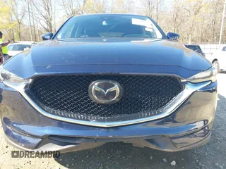 2018 Mazda CX-5 Grand Touring with VIN JM3KFADM1J0322049, listed as a IAAI auction lot 41891079 with 174,939 mi miles and . Bid and sale history available at DreamBid. Image 6.