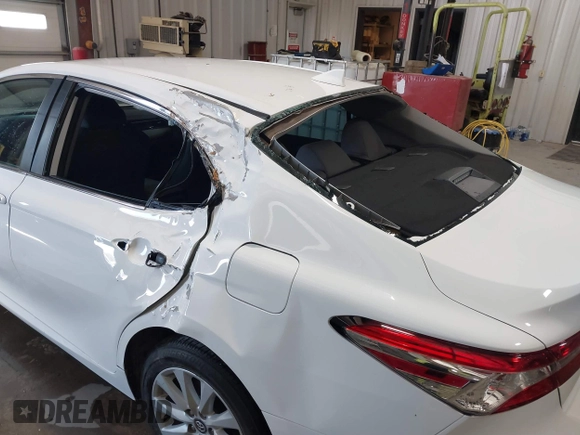 2019 Toyota Camry LE with VIN 4T1B11HK4KU853137, listed as a IAAI auction lot 41633785 with 67,629 mi miles and . Bid and sale history available at DreamBid. Image 6.