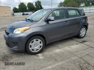 2011 Scion xD with VIN JTKKU4B41B1014726, listed as a Copart auction lot 65149405 with 210,102 mi miles and Salvage title. Bid and sale history available at DreamBid. Image 1.