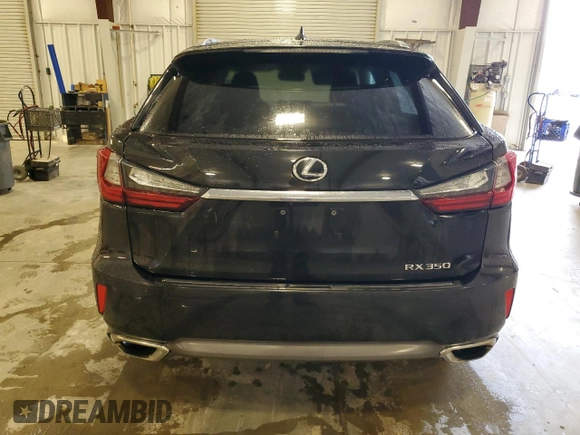 2018 Lexus RX 350 z VIN 2T2BZMCA1JC154178, wystawiony jako Copart lot #57751555 z przebiegiem 101 721 mil mil oraz Szkoda całkowita • Salvage title. Historia ofert i sprzedaży dostępna na DreamBid. Obrazek 6.