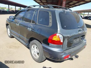 2004 Hyundai Santa Fe GLS with VIN KM8SC73E14U831372, listed as a IAAI auction lot 42297078 with 100,691 mi miles and . Bid and sale history available at DreamBid. Image 3.