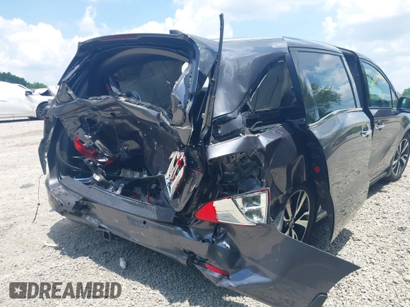 2018 Honda Odyssey Elite with VIN 5FNRL6H95JB087952, listed as a IAAI auction lot 42579817 with 96,577 mi miles and . Bid and sale history available at DreamBid. Image 6.