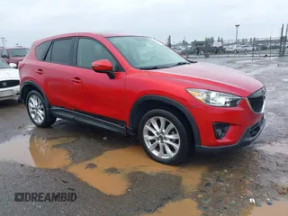 2015 Mazda CX-5 Grand Touring with VIN JM3KE4DY6F0501072, listed as a IAAI auction lot 41534176 with 90,160 mi miles. Bid and sale history available at carsss.com. Image 1.
