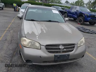 2000 Nissan Maxima GXE z VIN JN1CA31D0YT754624, wystawiony jako IAAI lot #42299290 z przebiegiem 81 958 mil mil oraz . Historia ofert i sprzedaży dostępna na DreamBid. Obrazek 12.