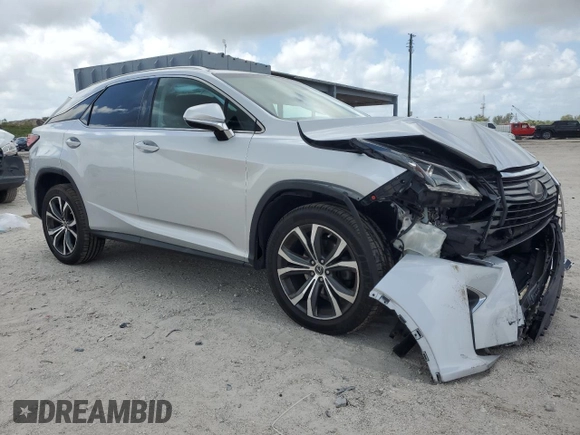 2018 Lexus RX with VIN 2T2ZZMCA6JC105511, listed as a Copart auction lot 51506765 with 123,467 mi miles and Non Repairable. Bid and sale history available at carsss.com. Image 4.
