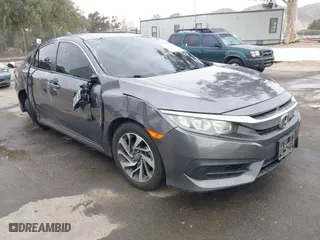 2018 Honda Civic Sedan EX with VIN 2HGFC2F73JH572129, listed as a IAAI auction lot 41719495 with 134,014 mi miles. Bid and sale history available at carsss.com. Image 1.