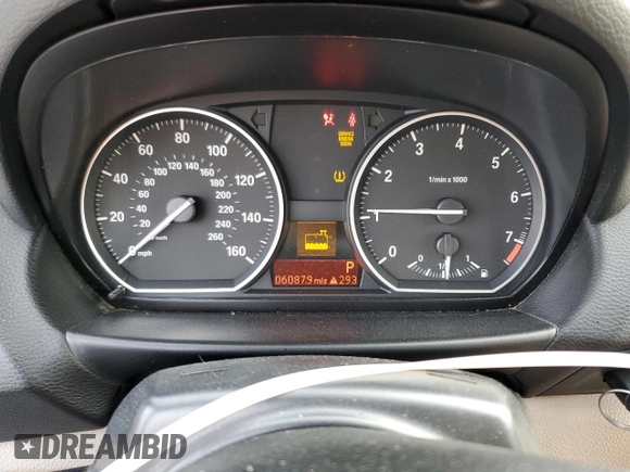 2011 BMW 1 Series 128i with VIN WBAUN1C58BVH82487, listed as a Copart auction lot 54295625 with 60,879 mi miles and Salvage title. Bid and sale history available at DreamBid. Image 9.