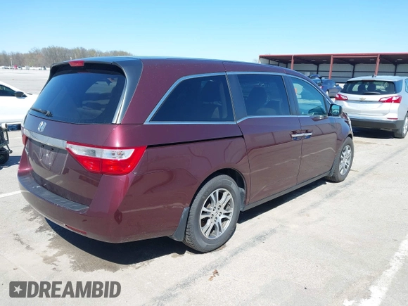 2012 Honda Odyssey EX with VIN 5FNRL5H42CB136915, listed as a IAAI auction lot 41972714 with 211,729 mi miles and . Bid and sale history available at carsss.com. Image 4.