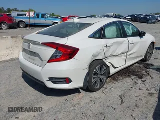 2018 Honda Civic EX-L z VIN 19XFC1F70JE000634, wystawiony jako IAAI lot #42020912 z przebiegiem 156 030 mil mil oraz . Historia ofert i sprzedaży dostępna na DreamBid. Obrazek 4.