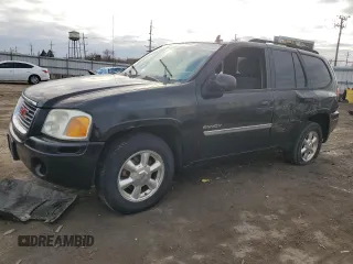 2006 GMC Envoy SLT with VIN 1GKDS13S762343520, listed as a Copart auction lot 82714134 with 0 mi miles and Clean Title. Bid and sale history available at carsss.com. Image 1.