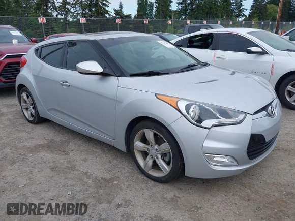 2014 Hyundai Veloster RE:FLEX z VIN KMHTC6AD6EU217282, wystawiony jako IAAI lot #42334268 z przebiegiem 68 473 mil mil oraz . Historia ofert i sprzedaży dostępna na DreamBid. Obrazek 1.