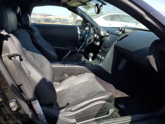 2004 Nissan 350Z Touring with VIN JN1AZ36A74T002301, listed as a Copart auction lot 61720524 with 101,779 mi miles and Salvage Title. Bid and sale history available at carsss.com. Image 10.