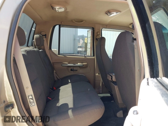 2001 Ford Explorer Sport Trac z VIN 1FMZU67E61UC47965, wystawiony jako IAAI lot #41984123 z przebiegiem 206 982 mil mil oraz . Historia ofert i sprzedaży dostępna na DreamBid. Obrazek 8.