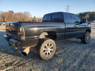 2001 Dodge Ram 2500 with VIN 3B7KF23621G194949, listed as a Copart auction lot 83362514 with 186,823 mi miles and Salvage Title. Bid and sale history available at carsss.com. Image 3.