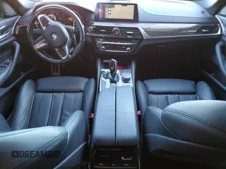 2018 BMW 5 Series 540i xDrive with VIN WBAJE7C5XJWD52054, listed as a Copart auction lot 47306535 with 49,185 mi miles and Salvage title. Bid and sale history available at DreamBid. Image 8.