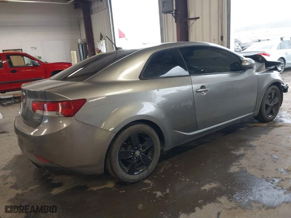 2010 Kia Forte Koup EX with VIN KNAFU6A22A5250830, listed as a IAAI auction lot 41680828 with 181006 miles. Bid and sale history available at carsss.com. Image 4.