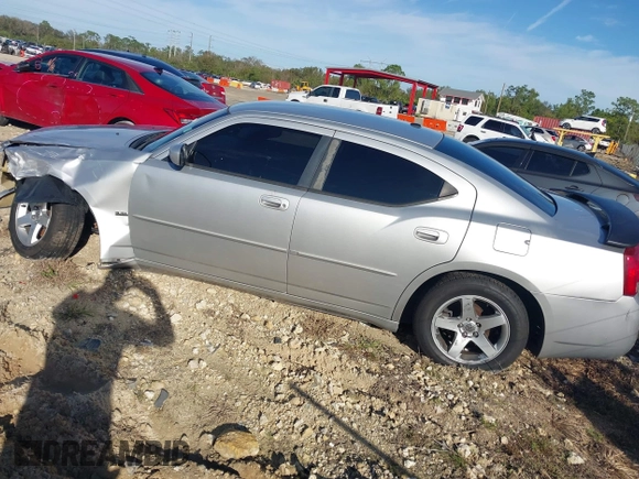 2010 Dodge Charger SXT with VIN 2B3CA3CV7AH312057, listed as a IAAI auction lot 38385104 with 178,259 mi miles and . Bid and sale history available at carsss.com. Image 3.