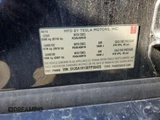 2014 Tesla Model S 60 with VIN 5YJSA1H13EFP38425, listed as a Copart auction lot 63686205 with 183,968 mi miles and Salvage title. Bid and sale history available at DreamBid. Image 13.