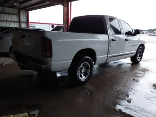 2002 Dodge 1500 with VIN 3D7HA18Z42G205690, listed as a IAAI auction lot 42174302 with 215,525 mi miles and . Bid and sale history available at DreamBid. Image 4.