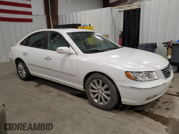 2009 Hyundai Azera Limited z VIN KMHFC46F29A371099, wystawiony jako Copart lot #57395815 z przebiegiem 69 313 mil mil oraz Szkoda całkowita • Salvage title. Historia ofert i sprzedaży dostępna na DreamBid. Obrazek 4.