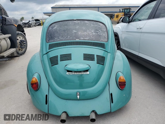 1969 Volkswagen Beetle with VIN 119682637V, listed as a Copart auction lot 70315404 with 59,148 mi miles and Salvage Title. Bid and sale history available at DreamBid. Image 6.