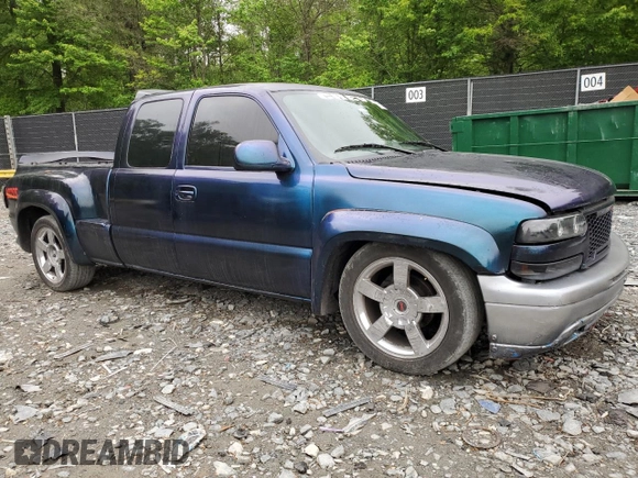 2001 Chevrolet Silverado 1500 LT with VIN 1GCEC19T31Z192995, listed as a Copart auction lot 55569865 with 238,730 mi miles and Salvage Title. Bid and sale history available at DreamBid. Image 4.