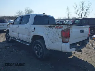 2017 Toyota Tacoma SR5 with VIN 3TMCZ5AN7HM117660, listed as a IAAI auction lot 41779468 with 121,878 mi miles and . Bid and sale history available at DreamBid. Image 3.
