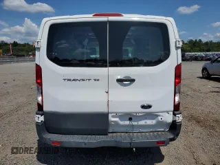 2016 Ford Transit Cargo z VIN 1FTYE1ZM0GKA05536, wystawiony jako Copart lot #65212565 z przebiegiem 146 219 mil mil oraz Czysty tytuł • Clean title. Historia ofert i sprzedaży dostępna na DreamBid. Obrazek 6.