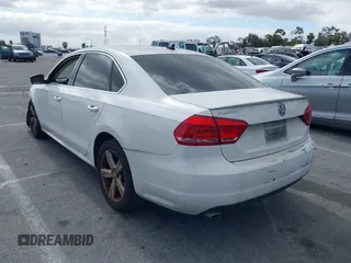 2013 Volkswagen Passat SE with VIN 1VWBP7A30DC056737, listed as a IAAI auction lot 42254753 with 160,732 mi miles and . Bid and sale history available at DreamBid. Image 3.