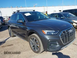 2021 Audi Q5 Premium Plus z VIN WA1BAAFY6M2013249, wystawiony jako IAAI lot #38681569 z przebiegiem 68 694 mil mil oraz . Historia ofert i sprzedaży dostępna na DreamBid. Obrazek 1.