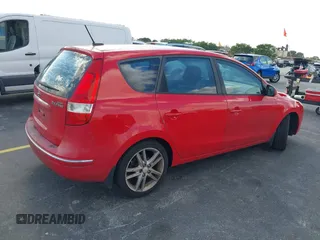 2009 Hyundai Elantra Touring z VIN KMHDC86E59U037556, wystawiony jako IAAI lot #41525627 z przebiegiem 253 875 mil mil oraz . Historia ofert i sprzedaży dostępna na DreamBid. Obrazek 4.