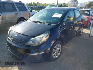 2017 Kia Rio LX with VIN KNADM4A31H6025775, listed as a IAAI auction lot 42034972 with 124,667 mi miles. Bid and sale history available at carsss.com. Image 2.