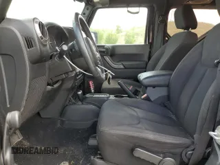 2014 Jeep Wrangler Sport with VIN 1C4AJWAG8EL159953, listed as a Copart auction lot 61175035 with 137,480 mi miles and Salvage title. Bid and sale history available at DreamBid. Image 7.