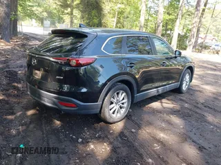 2016 Mazda CX-9 Sport with VIN JM3TCABY8G0112981, listed as a IAAI auction lot 42093389 with 106,384 mi miles. Bid and sale history available at carsss.com. Image 4.