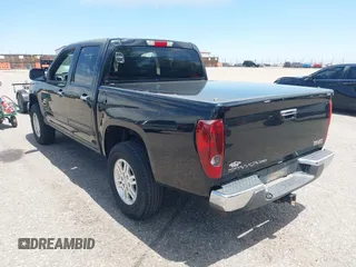 2011 GMC Canyon SLE1 z VIN 1GTH6MFE8B8112755, wystawiony jako IAAI lot #42359366 z przebiegiem 153 905 mil mil oraz . Historia ofert i sprzedaży dostępna na DreamBid. Obrazek 3.